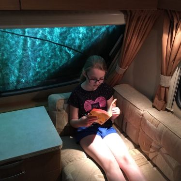 Ellie Reading in bizarre place